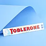 Intricate Trishul Rakhi & Toblerone Delight