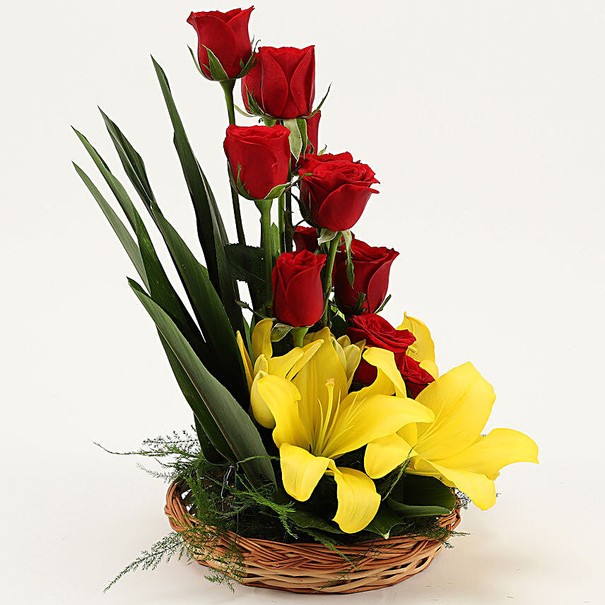 Buy Send Asiatic Lilies Red Roses Cane Basket Arrangement Online Ferns N Petals