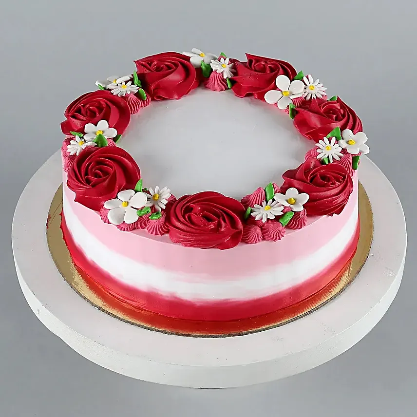 Buy/Send Lovely Red Roses Around Vanilla Cake Eggless Half Kg Online- FNP