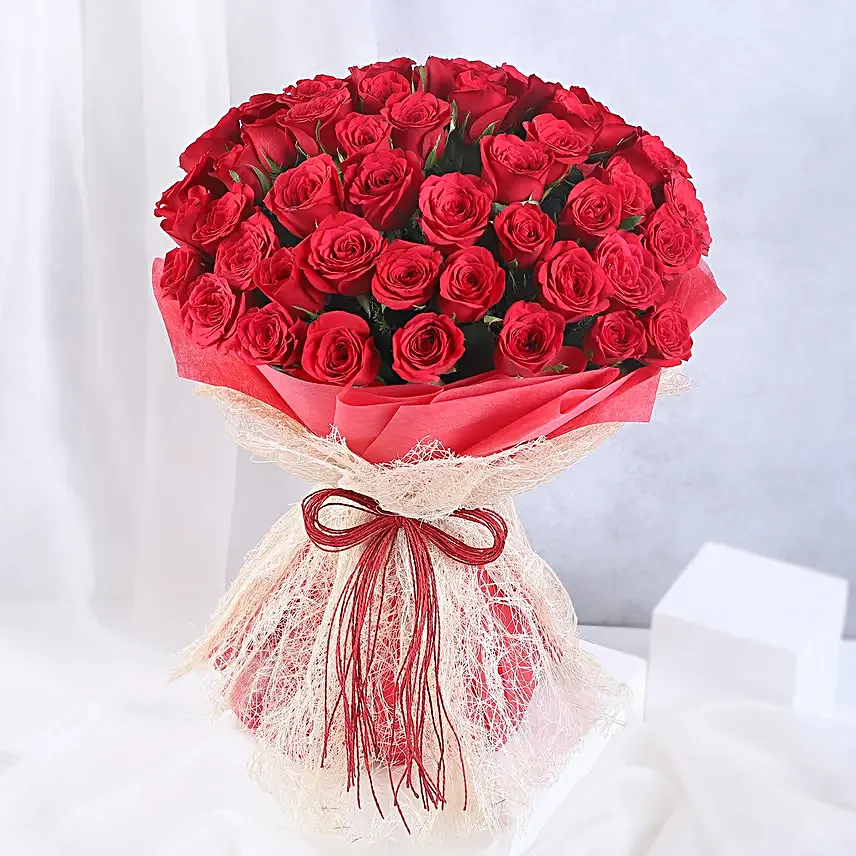 Buy/Send Vivid 50 Red Roses Bouquet Online- FNP