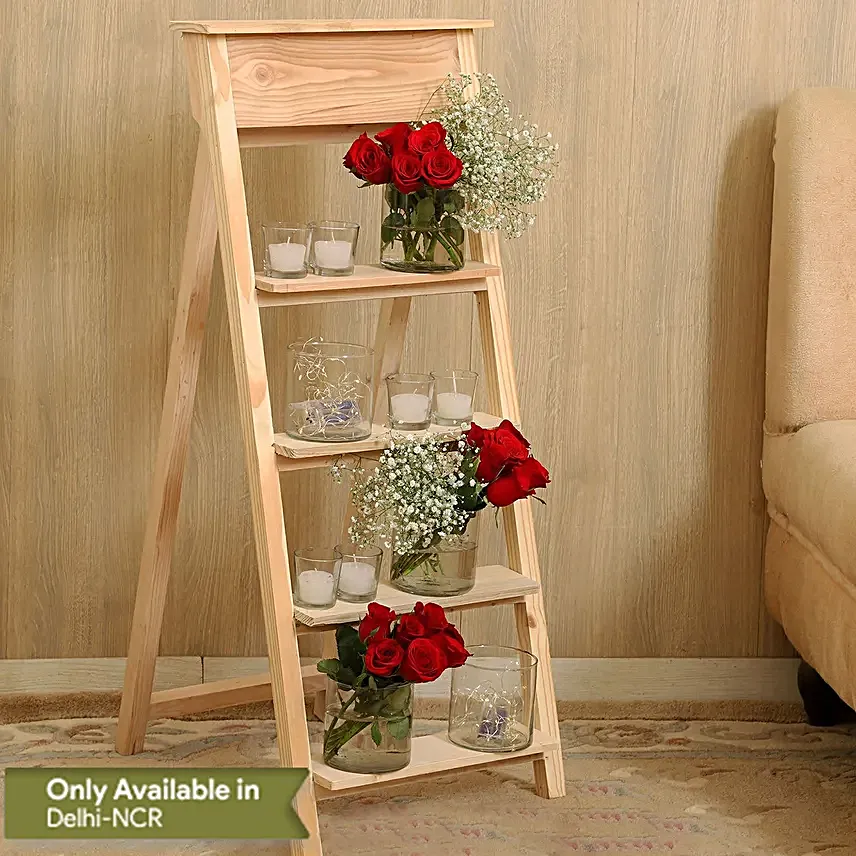 5 Cylindrical Red Roses On Wooden Ladder