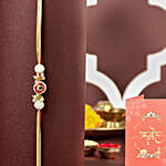 Crimson Majestic Pearl Rakhi & Ferrero Delight