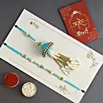 Jhumar Bhaiya-Bhabhi Pearl Rakhi Set & Nuts Combo