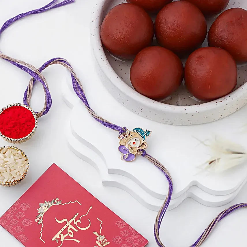 Bal Ganesha Cheerful Charm Rakhi & Sweet Treat